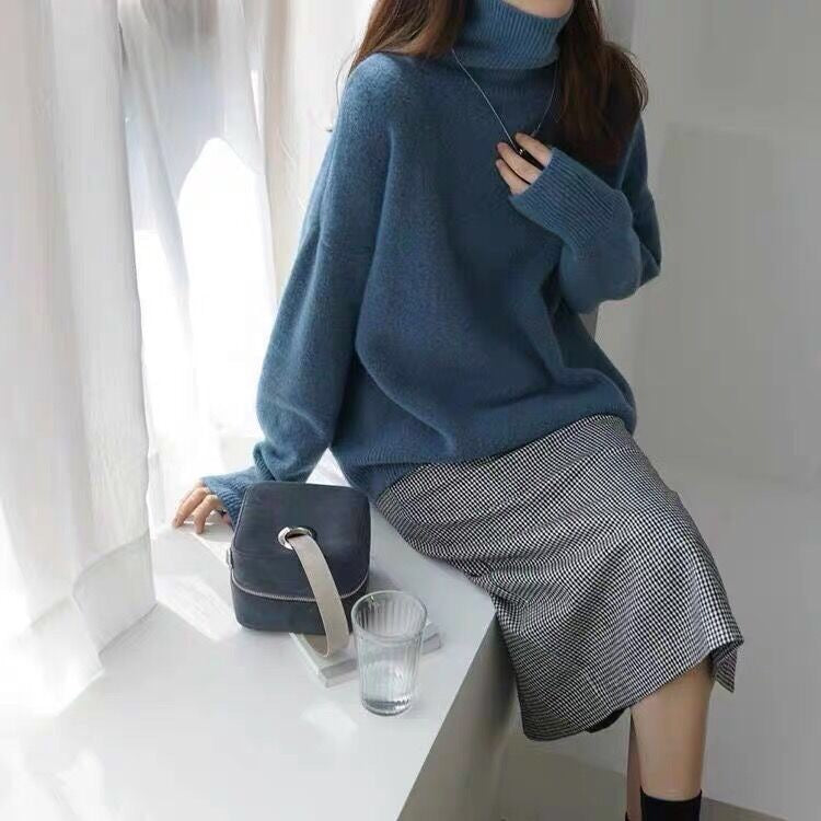 High-necked, padded sweater with a baggy look