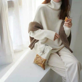 High-necked, padded sweater with a baggy look